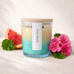Hand-poured Spring Clean beeswax candle in amber glass jar