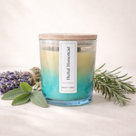 Hand-poured Herbal Homestead beeswax candle in amber glass jar